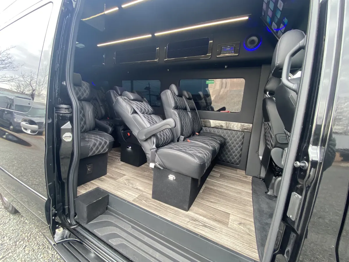 Executive Sprinter passenger seating and cabin lighting, Newark — interior view 1