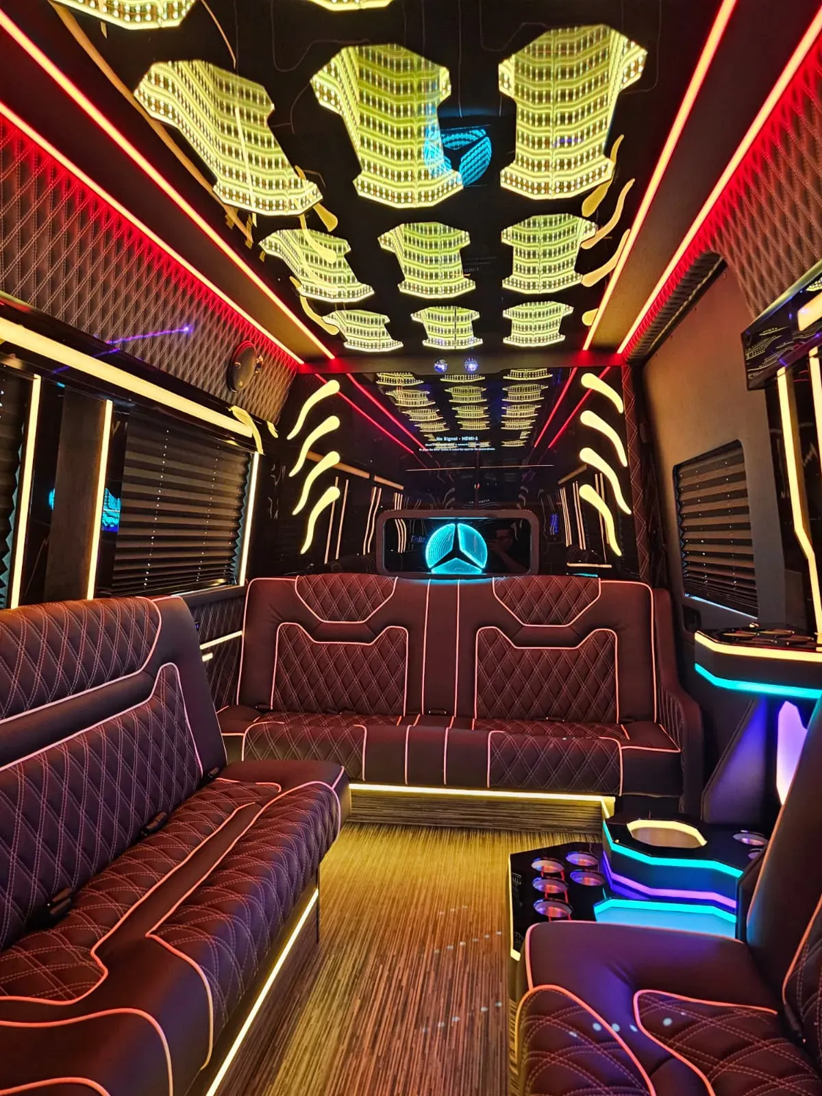 Limo Sprinter lounge seating and illuminated ceiling, Event Transportation — interior view 1