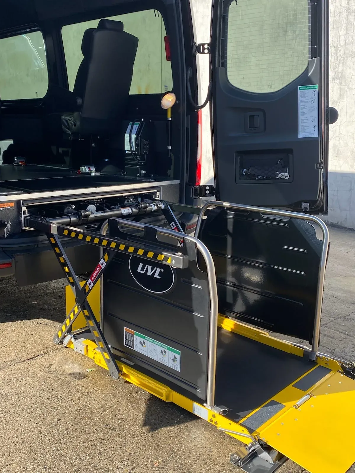 Wheelchair-accessible Sprinter rear boarding lift, Wheelchair-Accessible Executive Travel