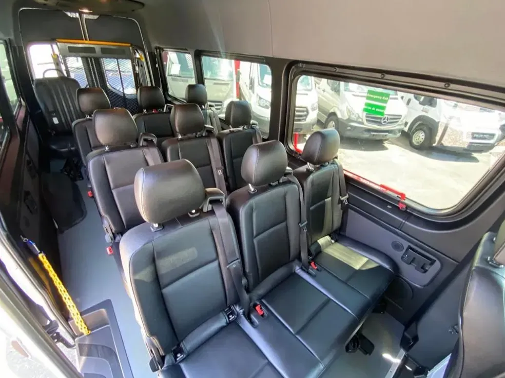 Wheelchair-accessible Sprinter passenger seating and aisle, Wheelchair-Accessible Executive Travel — interior view 1